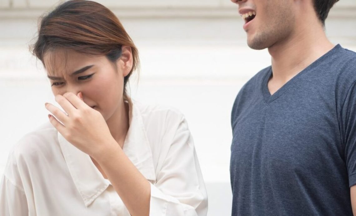 Why Does My Breath Smell Like Poop? Causes & Fixes 2026