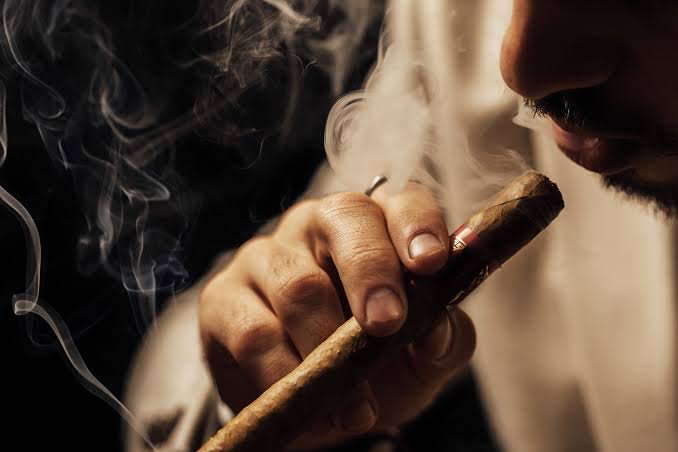 Why Do People Smoke Cigars for Relaxation & Status 2026