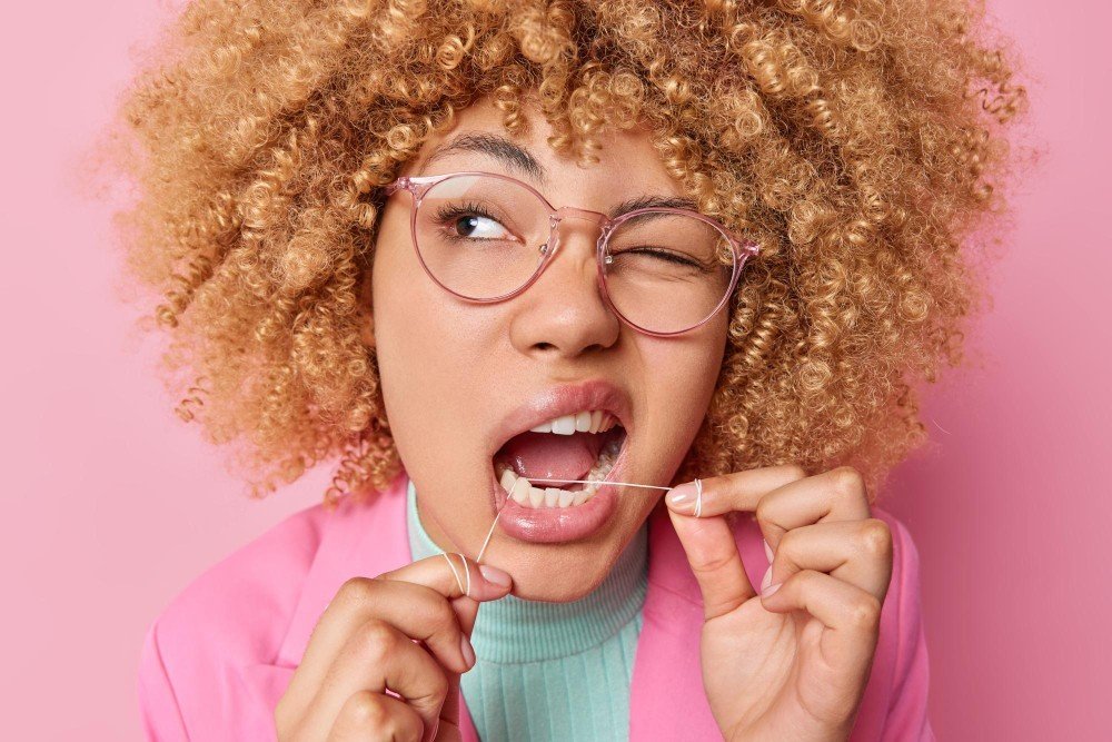 Why Does My Floss Smell Like Poop? Fix Bad Breath 2026