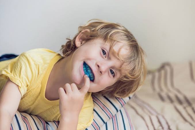 Why Do Kids Grind Their Teeth? Causes & What to Do 2026