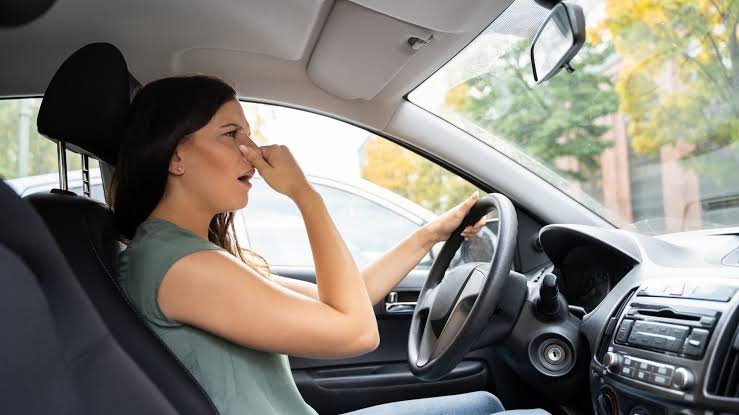 Why Does My Car Smell Like It's Burning? (2026 Guide) 